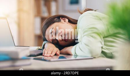 Tired, sleeping and woman on laptop for remote work exhausted for project, report and working from home. Stress, overworked and female person with Stock Photo