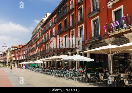 View of Plaza Mayor, central square, with its historic beautiful red buildings during the sunny day. Valladolid, Castilla y León, Spain. Stock Photo