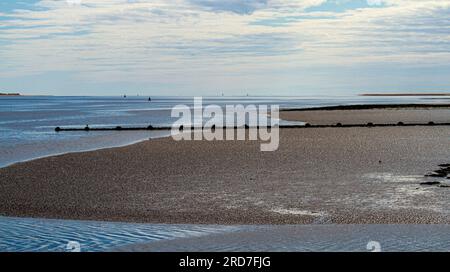 Dundee, Tayside, Scotland, UK. 19th July, 2023. UK Weather: Warm sunny July weather across Tayside, Scotland, with highs around 20°C. A beautiful morning view of Dundee City, Broughty Ferry, and the River Tay photographed from Tayport in Fife across the river. Credit: Dundee Photographics/Alamy Live News Stock Photo