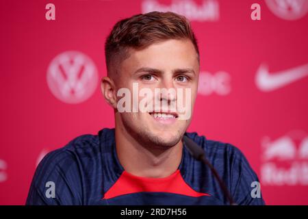 Leipzig, Germany. 19th July, 2023. Soccer, Bundesliga, RB Leipzig: Press conference at the Red Bull Academy. Leipzig player Christoph Baumgartner sits in a press conference. Credit: Jan Woitas/dpa/Alamy Live News Stock Photo