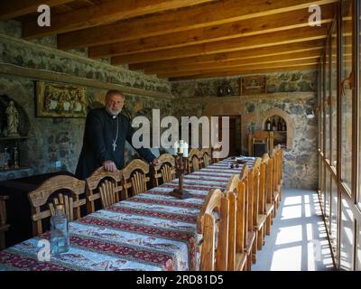 Stepanakert, Azerbaijan. 14th June, 2019. A priest seen inside Dadivank, an Armenian Apostolic monastery, in Kalbajar, Nagorno-Karabakh. The unrecognised yet de facto independent country in South Caucasus, Nagorno-Karabakh (also known as Artsakh) has been in the longest-running territorial dispute between Azerbaijan and Armenia in post-Soviet Eurasia since the collapse of Soviet Union. It is mainly populated by ethnic Armenians. (Credit Image: © Jasmine Leung/SOPA Images via ZUMA Press Wire) EDITORIAL USAGE ONLY! Not for Commercial USAGE! Stock Photo