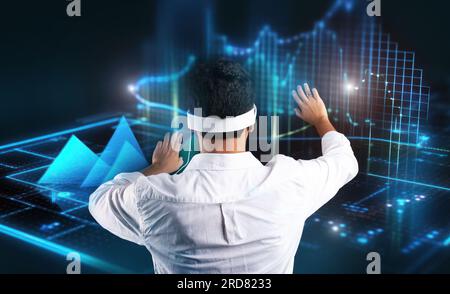 Touch to future. Man in vision pro vr glasses touching glowing virtual holographic picture, enjoying modern technologies Stock Photo