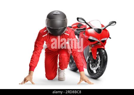 Motorbike racer in a set position preparing for a run isolated on white background Stock Photo