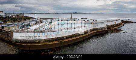 PENZANCE, CORNWALL, UK - JULY 4, 2023. Aerial panorama landscape of the exterior of The Jubilee outdoor swimming pool in Penzance, Cornwall Stock Photo