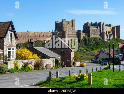 Bamburgh Castle, from the village centre, Bamburgh, Northumberland Coast, Northumbria, England, United Kingdom, Europe Stock Photo