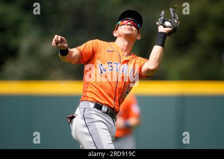 Houston Astros' Mauricio Dubon looks at his bat as he waits to hit