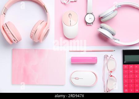 Composition with different gadgets, stationery and eyeglasses on white background Stock Photo