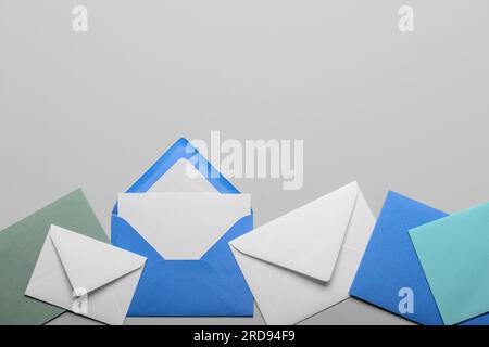 Composition with different envelopes on white background Stock Photo