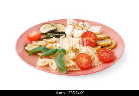 Plate of tasty pasta salad with tomatoes and basil on white background Stock Photo