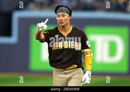 San Diego Padres' Ha-Seong Kim reacts after scoring on a single