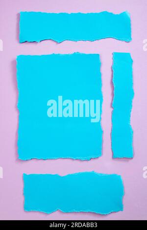 Ripped blue paper strips on purple background, arranged as webpage elements Stock Photo
