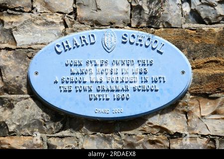 Small oval sign for the Chard Preparatory School along Fore Street in the old town, Chard, Somerset, UK, Europe, Chard, Somerset. Stock Photo