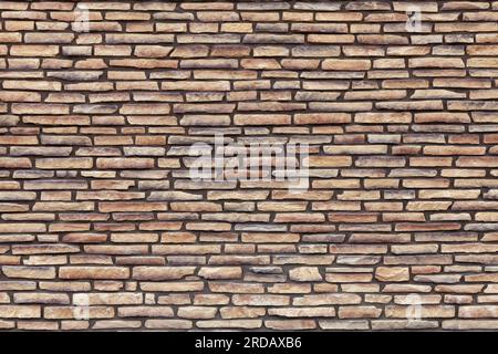 Texture of a wall made of flat stones. Stock Photo