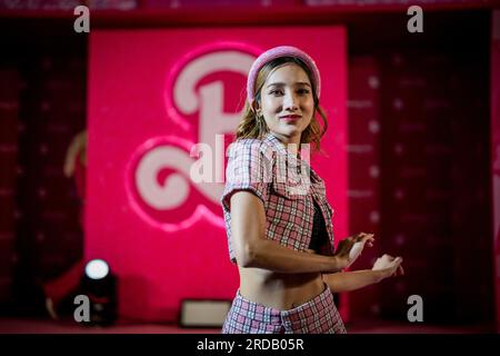 Bangkok, Thailand. 20th July, 2023. A dancer performs at the 'Barbie' movie premiere in Bangkok. Fans and artists attend the exclusive pink carpet premiere of 'Barbie' at Siam Paragon Cineplex on July 19, 2023. Credit: Matt Hunt/Neato/Alamy Live News Stock Photo