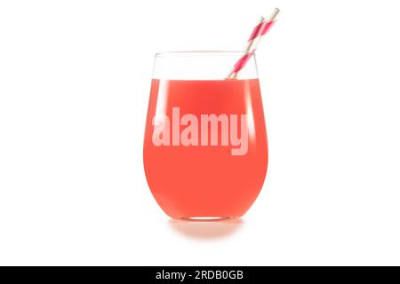 Glass full of pink grapefruit juice with two paper drinking straws isolated on white background. Stock Photo