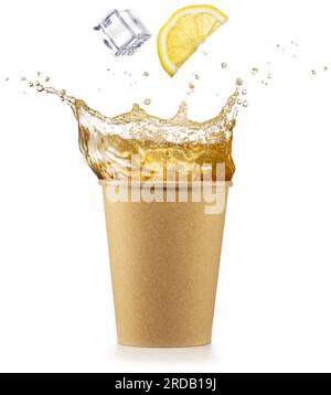 Flying lemon slice and ice cube falling into splashing iced tea in disposable paper cup. Refreshing beverage in eco friendly to go packaging. Real sho Stock Photo
