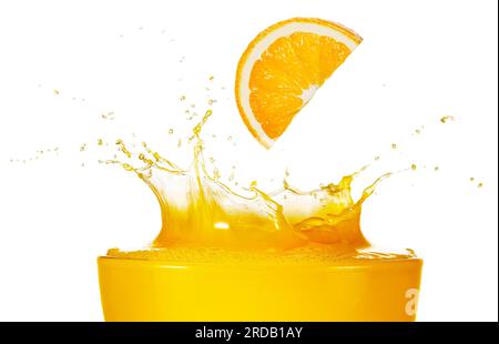 Orange slice falling into splashing freshly made squeezed juice isolated on white background. Real studio shot. Stock Photo