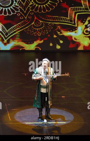 Jakarta, Indonesia. 19th July, 2023. A singer from China's Xinjiang Art Theater Muqam Art Troupe performs in Taman Ismail Marzuki in Jakarta, Indonesia, July 19, 2023. Dozens of dancers and singers from China's Xinjiang Art Theater Muqam Art Troupe enlivened the stage of Taman Ismail Marzuki, the art center here in Indonesia's capital on Wednesday night.TO GO WITH 'Art troupe from China's Xinjiang enlivens Muslim festival in Indonesian cities' Credit: Xu Qin/Xinhua/Alamy Live News Stock Photo