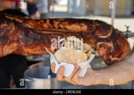 famous traditional portugal pork sandwich called bifana to take away . Stock Photo