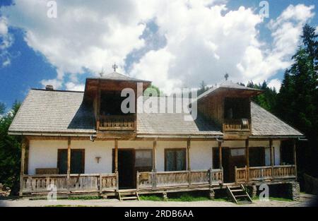 Neamt County, Romania, 1999. Exterior of a simple traditional house serving as monastic cells at Petru Voda Monastery. Stock Photo