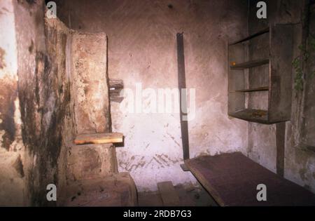 Tarcau Monastery, Neamt County, Romania, 1999. Interior of an abandoned, unkempt monastic cell. Stock Photo