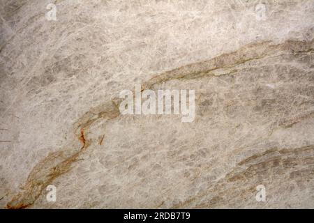 Unique texture of natural Quartzite, A soft pattern of light gray and beige cracks. Stock Photo