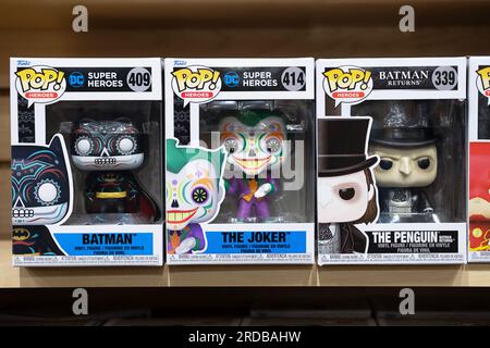 3 Batman related Funko Pop figurines for sale at  Newbury Comics, a store in the Danbury Fair Mall in Connecticut. Stock Photo