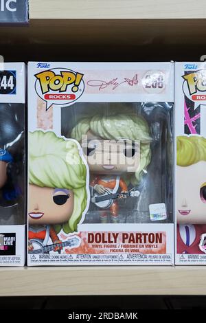 A Funko Pop figurine of country music superstar Dolly Parton. For sale at  Newbury Comics, a store in the Danbury Fair Mall in Connecticut. Stock Photo