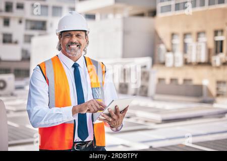 Engineering, man and tablet for solar panels, construction portrait and online blueprint in city or sustainability heating. Digital technology Stock Photo