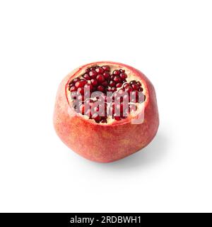 Ripe pomegranate fruit peeled on a white background top view close-up. Large open pomegranate fruit with large ripe grains isolated. Stock Photo
