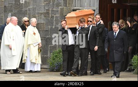 Ronan Keating (centre middle right) helps carry the coffin of his brother Ciaran Keating out of St Patrick's Church in Louisburgh, Co Mayo, after his funeral. The older brother of Ronan Keating died in a two-car crash near Swinford in Co Mayo on Saturday. Picture date: Thursday July 20, 2023. Stock Photo