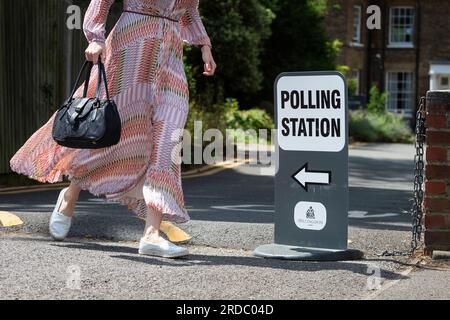 London, UK.  20 July 2023. A woman departs the polling station at St Andrew's Church in Uxbridge, north west London.  Local residents in the constituency of Uxbridge and South Ruislip are voting in a by-election to choose their new Member of Parliament after the resignation of their former MP, Boris Johnson.  Two other constituencies, Selby and Ainsty, and Somerton and Frome, which were won by Conservatives at the last general election in 2019, are also having a by-election today.  Credit: Stephen Chung / Alamy Live News Stock Photo