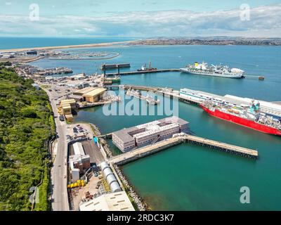 Portland, Dorset, UK.  20th July 2023.  Aerial view of the accommodation barge the Bibby Stockholm at its dock at Portland Port near Weymouth in Dorset, where it will house up to 500 asylum seekers for the next 18 months.  It arrived on Tuesday morning and is being prepared to receive the first asylum seekers which are due to arrive next week.  Picture Credit: Graham Hunt/Alamy Live News Stock Photo