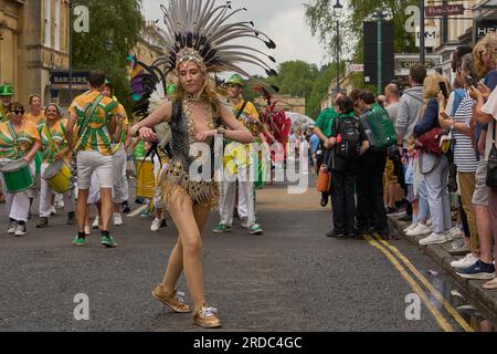 Dancers and musicians dressed in ornate costumes parade through the streets  of Bath in the annual carnival Stock Photo - Alamy