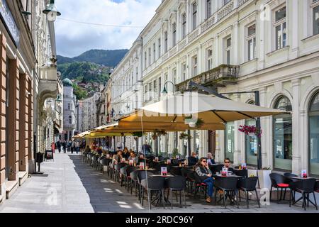 Outdoor cafeterias on the Strossmayerova promenade in central Sarajevo,  Bosnia Herzegovina, Balkan Peninsula, Eastern Europe. Stock Photo