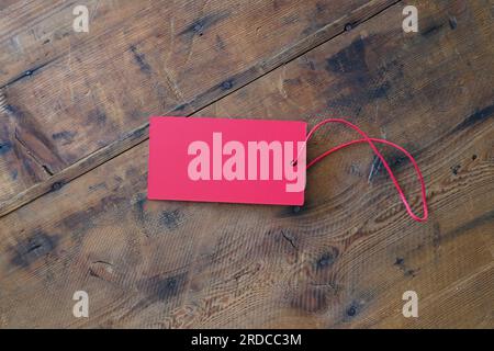 red gift paper tag with string Stock Photo
