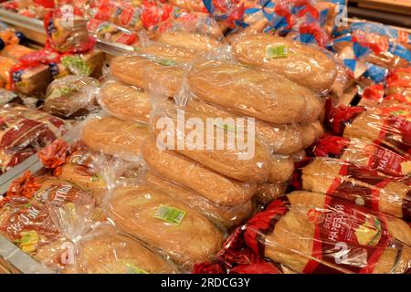 Moscow, Russia - July 10. 2023. Various breads in a packaging on the counter in Selgros Cash and Carry shop Stock Photo