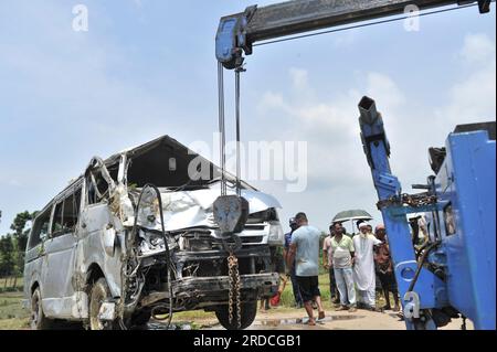 Sylhet, Bangladesh. 20th July, 2023. Crane lifting the wrecked Microbus. The accident took place at Sundargaon under Goainghat police station on the Sylhet-Kompaniganj highway around 8:30 am on Thursday (July 20), and six people were killed in the head-on collision. Five people died on the spot and one more on the way to the hospital. On 20 July 2023 Sylhet, Bangladesh (Photo by Md Rafayat Haque Khan/ Credit: Eyepix Group/Alamy Live News Stock Photo