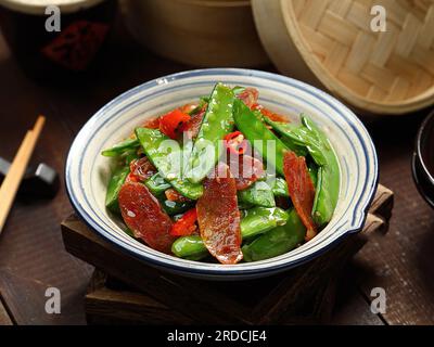 Sambal Fried French Bean with  Preserved Pork (cured pork) Stock Photo