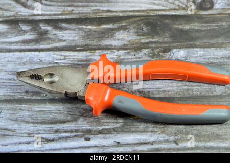Electricity Pliers, an important tool for electricians, useful when working with electrical wire, essential and are used to cut, straighten, twist, an Stock Photo