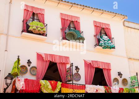 Colorful Spanish flamenco dresses hanging and drying on the balcony, Marbella; Spain. Stock Photo