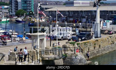 The waterside locations of Plymouth offer a range of pubs and restaurants for tourists visiting this town with it's rich history of maritime travel Stock Photo