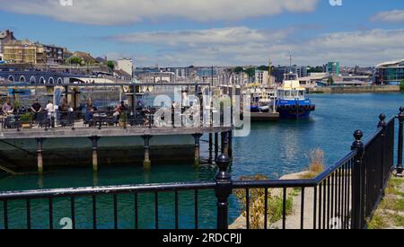 The waterside locations of Plymouth offer a range of pubs and restaurants for tourists visiting this town with it's rich history of maritime travel Stock Photo