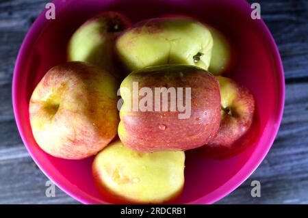 Bowl full of Egyptian fresh Apples, An apple is a round, edible fruit produced by an apple tree (Malus domestica). Apple trees are cultivated worldwid Stock Photo