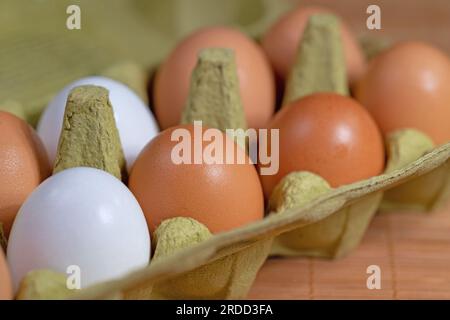 Brown and white chicken eggs in the packaging Stock Photo