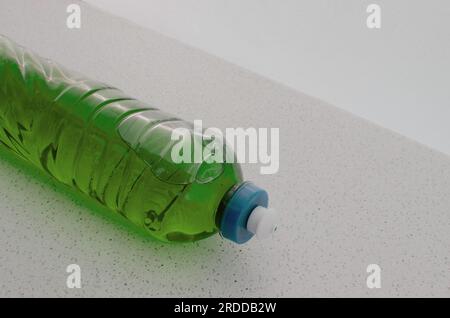 Closeup of detergent on the table, revealing the power of cleaning in your hands. Make your dishes shine with practicality and efficiency. Stock Photo