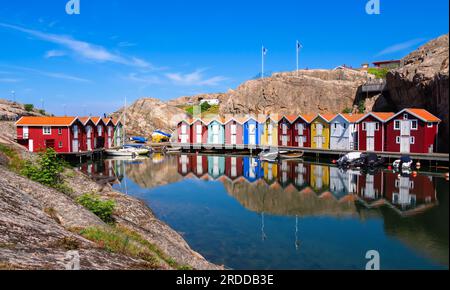 Idyllic colorful fisherman cabins Smogenbryggan in Smogen, Sweden. Typical Swedish wooden house constructions. Stock Photo