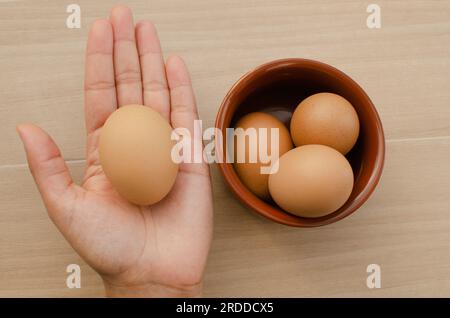 Closeup of brown chicken eggs, a versatile and delicious option for many culinary recipes. Stock Photo