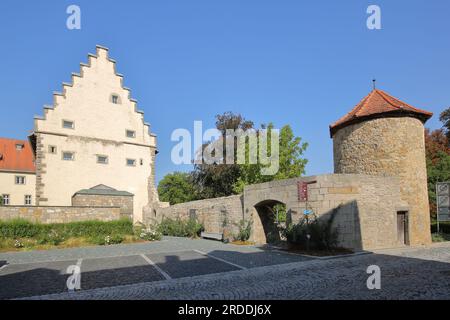 Old castle built in 1512 with stepped gable with powder tower and city wall, Mellrichstadt, Rhön, Lower Franconia, Franconia, Bavaria, Germany Stock Photo