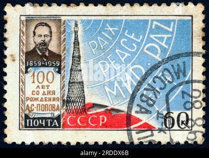 Alexander Stepanovich Popov (1859 – [O.S. 1905] 1906). Postage stamp issued in the USSR in 1959 on the 100th anniversary of Popov's birth. Popov (sometimes spelled Popoff) was a Russian physicist, who was one of the first persons to invent a radio receiving device. Stock Photo